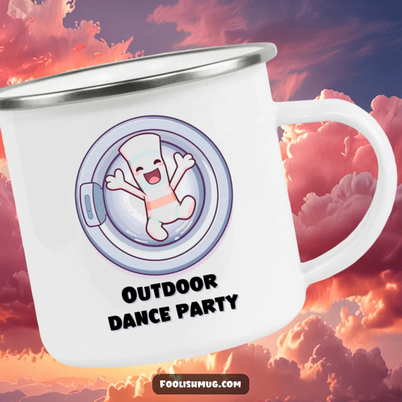 Funny sock character dancing wildly out of a washing machine on a camping mug, offering humorous enjoyment during outdoor activities.