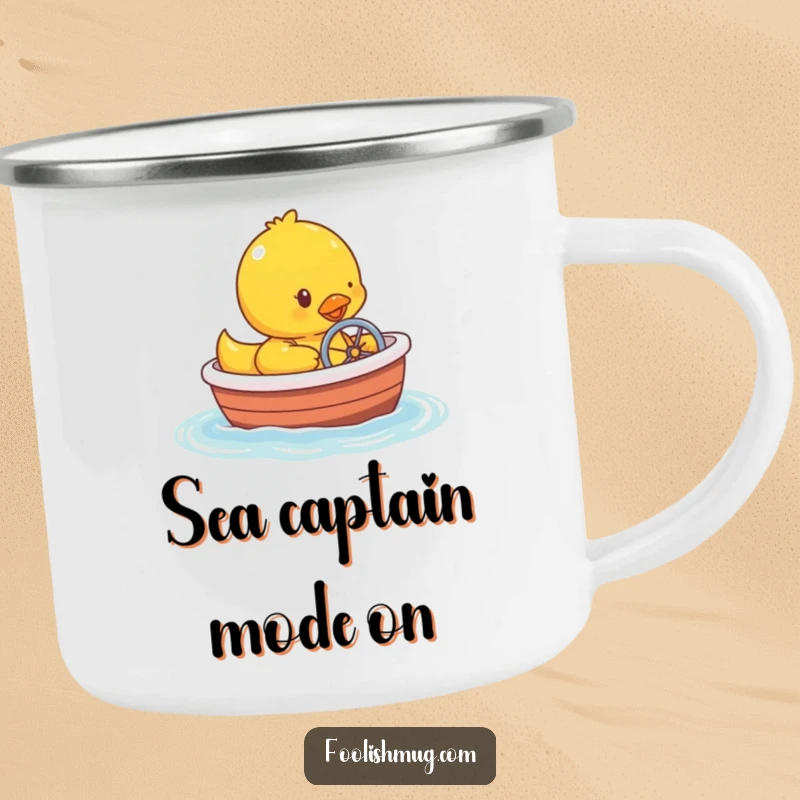 Funny rubber ducky character steering a bathtub boat on a durable camping mug, ready for adventure.