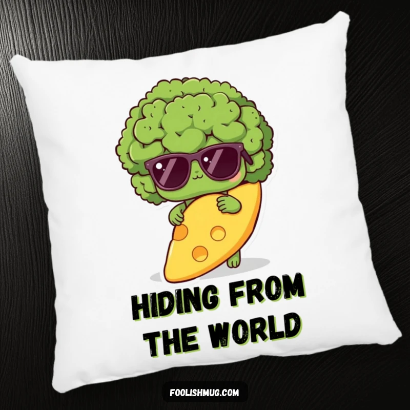 Funny shy broccoli pillow, depicting a broccoli with sunglasses hiding behind a giant cheese slice, offering cozy and humorous home decor.