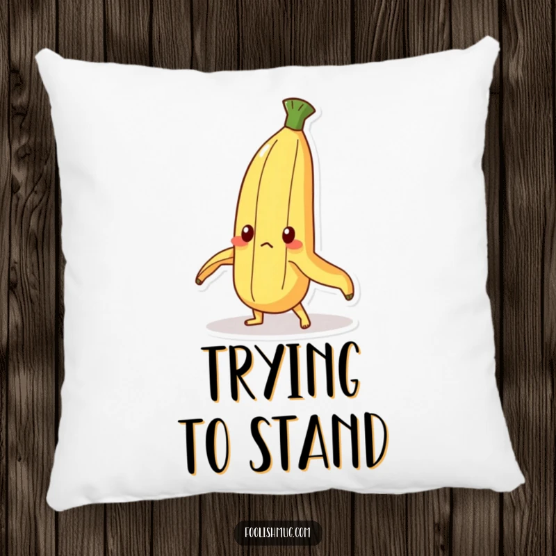Funny Pillow: A determined banana peel character humorously trying to stand upright. Soft, humorous home decor with a message.