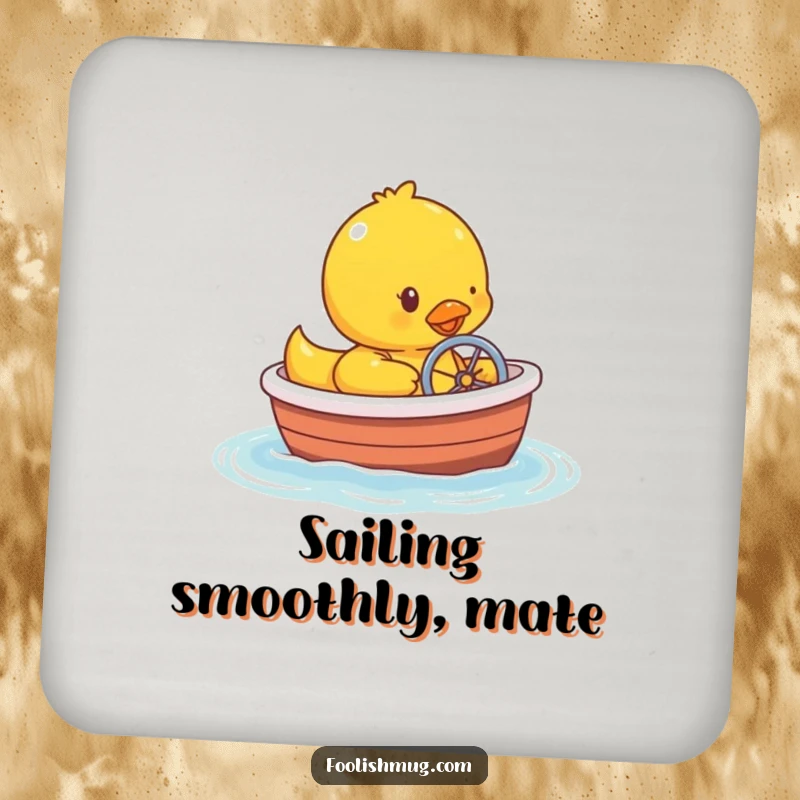 Funny rubber ducky character steering a miniature bathtub boat on a drink coaster.