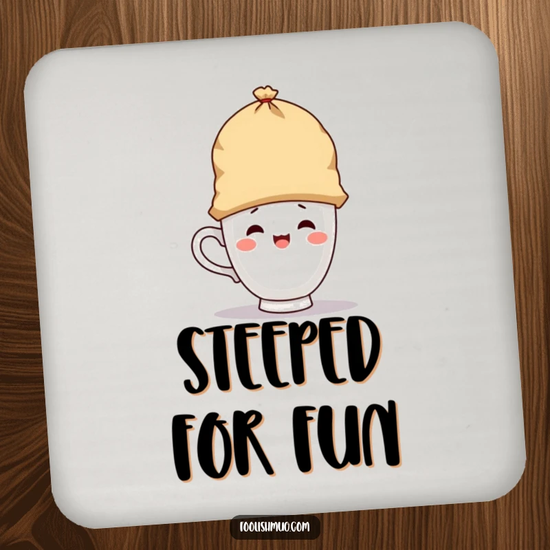 Funny drink coaster showing a playful teacup character wearing a giant teabag as a hat, functional and humorous as a funny gift.