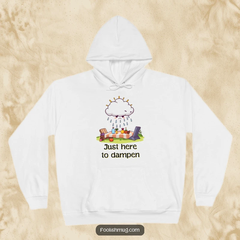 Funny hoodie featuring a cantankerous cloud attempting to rain on a sunny picnic, a humorous statement piece for introverts.