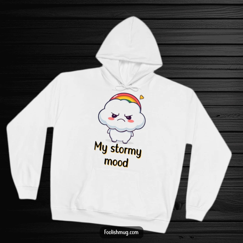 Funny Hoodie: A grumpy cloud character being playfully tickled by a tiny, vibrant rainbow.
