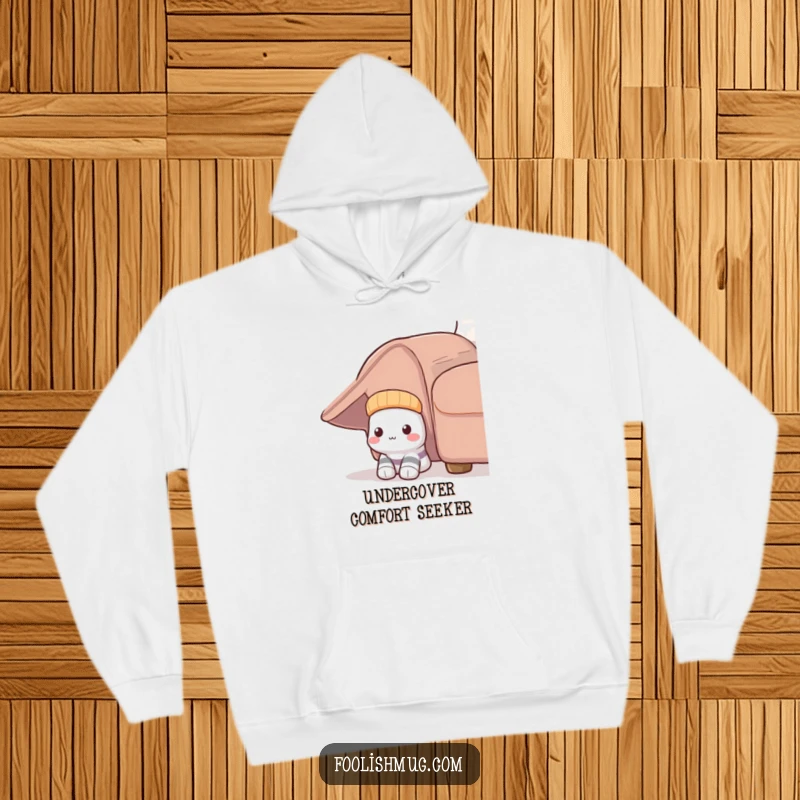 Funny Shy Sock Hoodie: A comfortable hoodie featuring a shy sock hilariously peeking from beneath furniture, perfect for cozy days.