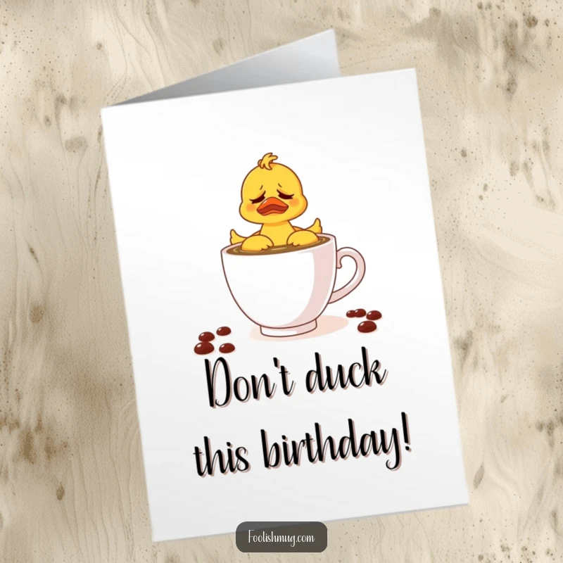 Funny Free Printable Birthday Card: Rubber Ducky Struggling in a Teacup of Coffee, Looking Annoyed
