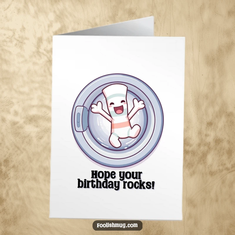 Funny free printable birthday card featuring a mischievous sock character joyfully dancing out of a washing machine.