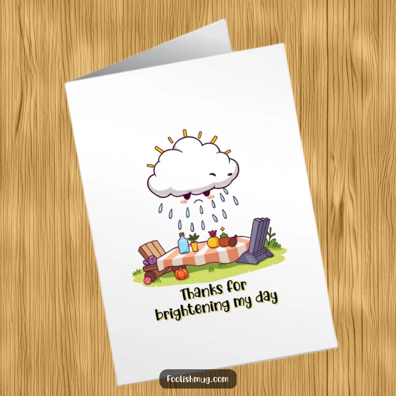 Funny Free Printable Thank You Card: A cloud frowning and raining on a picnic, conveying thanks with a sigh.