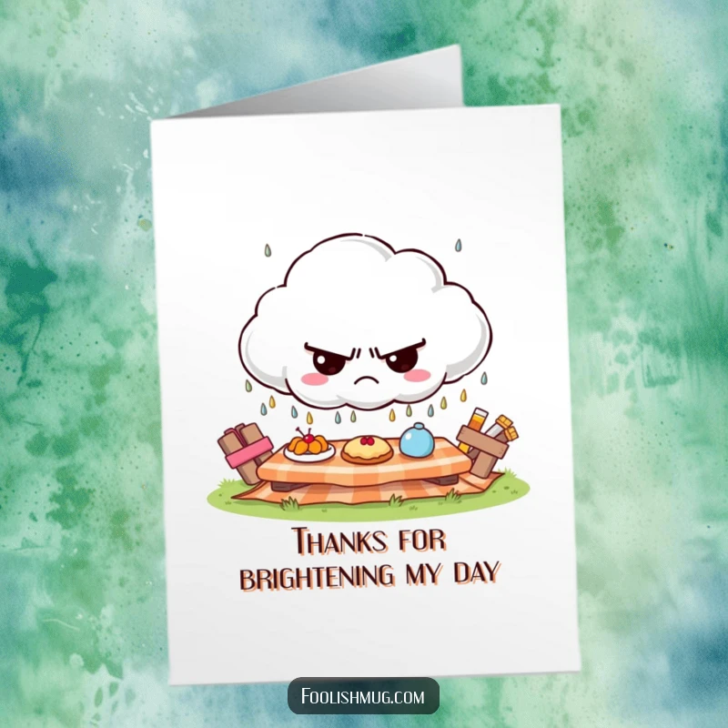 Funny free printable thank you card: A grumpy cloud character rains tiny frowns onto a sunny picnic, delivering thanks ironically.
