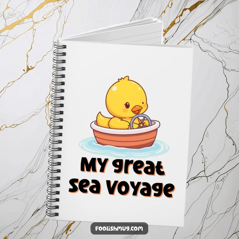 Funny rubber ducky character steering a tiny bathtub boat on the cover of a notebook.