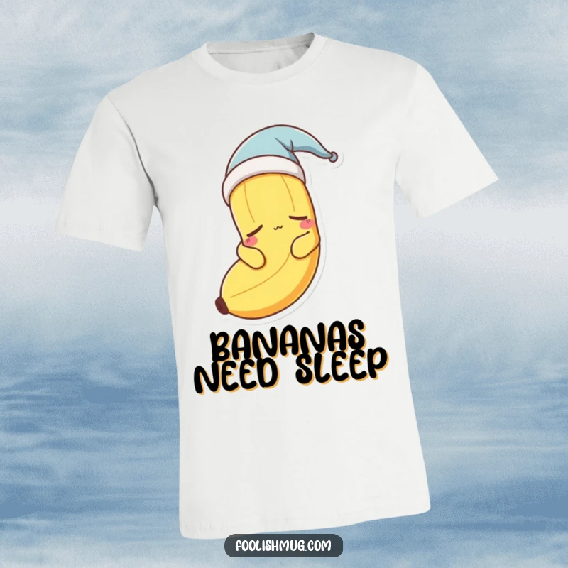 Funny banana character in a nightcap, yawning and looking sleepy on a t-shirt. Cute.