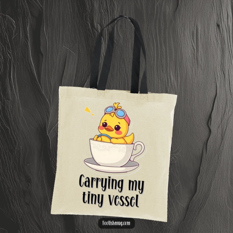 Funny tote bag with a confused rubber ducky character piloting a teacup, giving off a charmingly lost-at-sea vibe.
