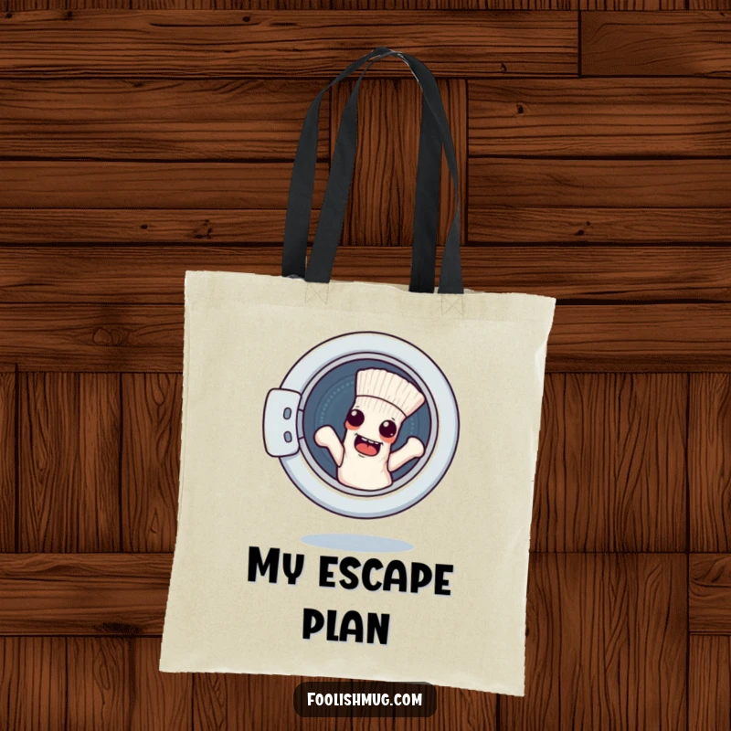 Funny tote bag with a mischievous sock character attempting to escape a washing machine, perfect for carrying laundry essentials.